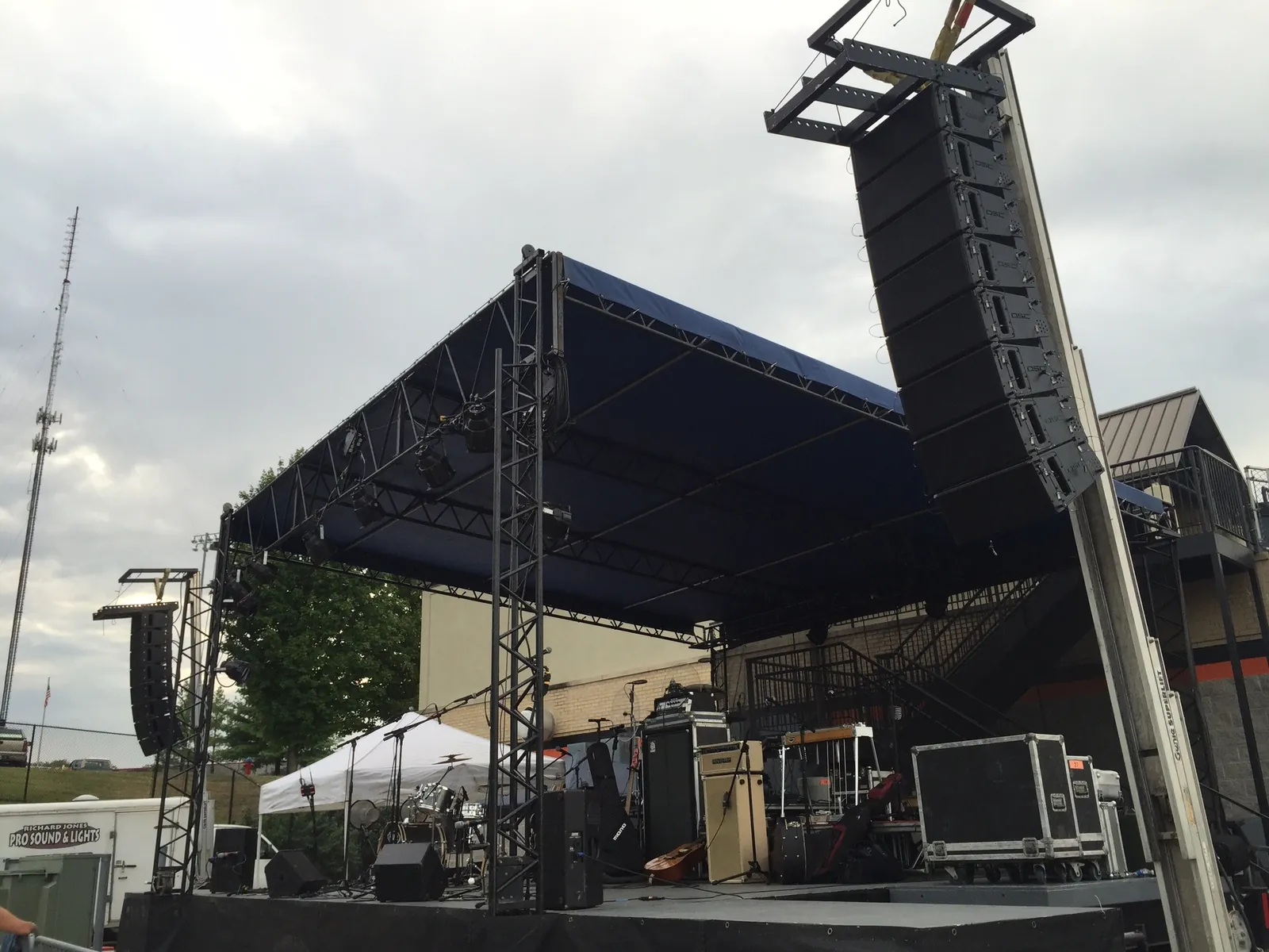 Rental sound and lighting gear staged and ready for an event